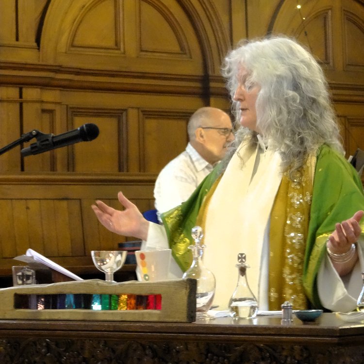 Revd Cate Jacobs celebrating communion Revd Cate Jacobs celebrating communion