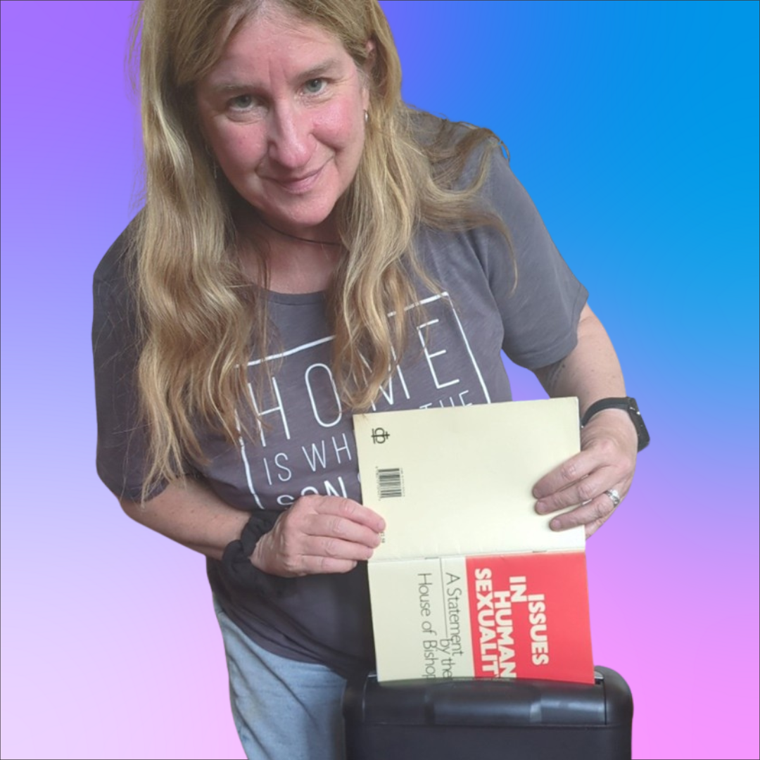 OTN Co-Chair Dr Carol Joyner prepares to shred a copy of Issues in Human Sexuality: A statement from the House of Bishops (1991) which was withdrawn by the Church of England General Synod last month.